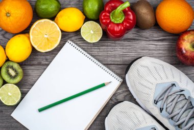 Fitness kavramı meyve ile. Üstten Görünüm arka plan kavramı. Fitness