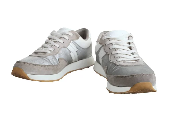 Een paar zilveren sneakers — Stockfoto