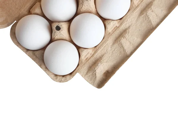 Белые яйца в коробке для яиц — стоковое фото