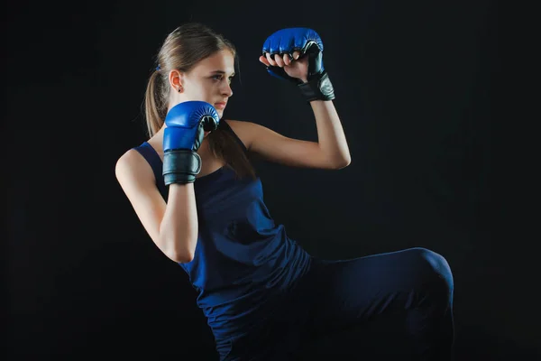 Girl in boxing gloves