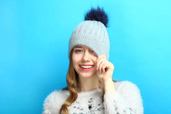 Girl in a cap with a pompon — Stock Photo, Image