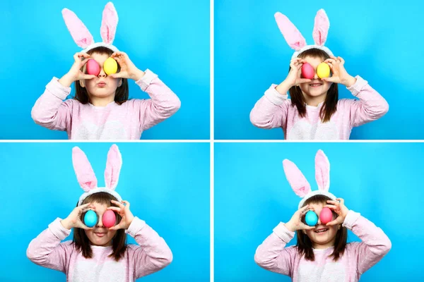 Girl in a rabbit costume with Easter eggs — Stock Photo, Image