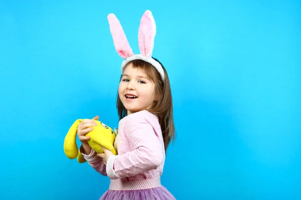Girl in a pink hare suit — Stock Photo, Image