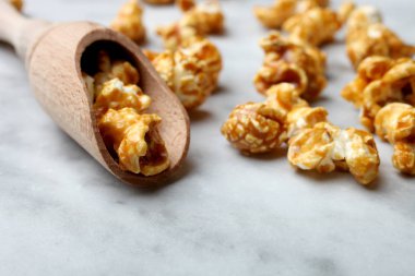 Karamelli patlamış mısır, Kıpti alanı. 