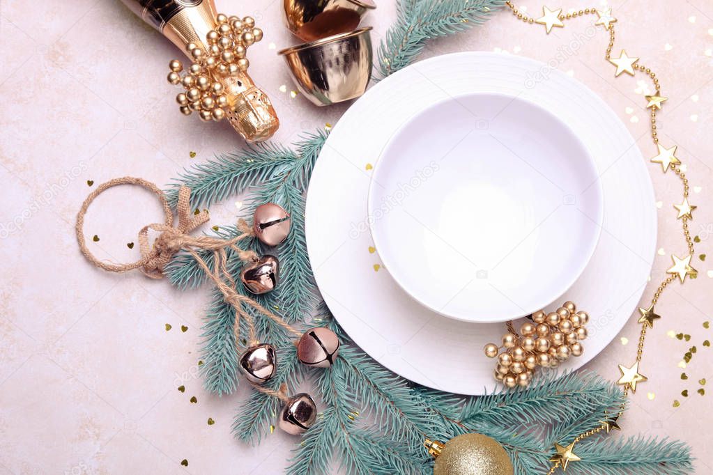 Ceramic dishes with golden Christmas decor 
