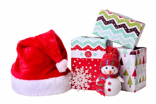 Christmas presents and Santa hat — Stock Photo, Image