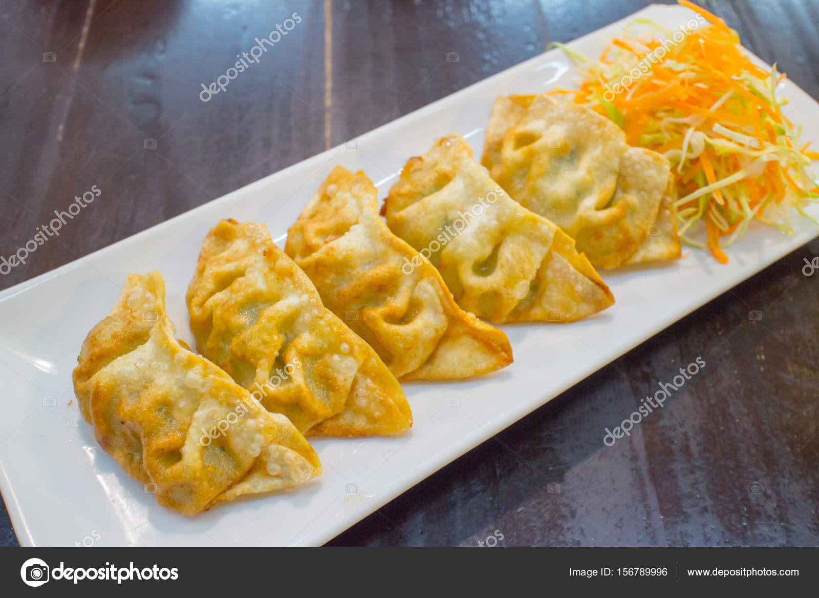 Gyoza Japanese PanFried Dumplings Stock Photo by ©Ekachai.S 156789996