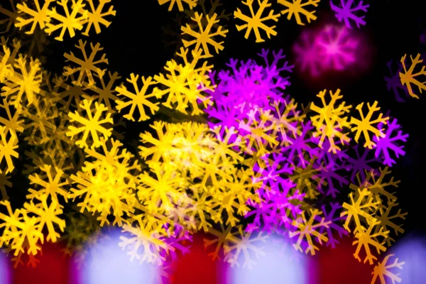 Abstrait Jaune Violet lumières neige flocons fond bokeh — Photo