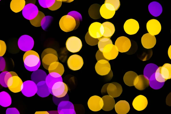 Resumen Amarillo púrpura luces fondo bokeh —  Fotos de Stock