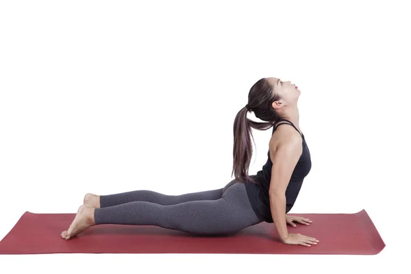 Portrait of young asian woman exercise playing yoga isolated whi — Stock Photo, Image