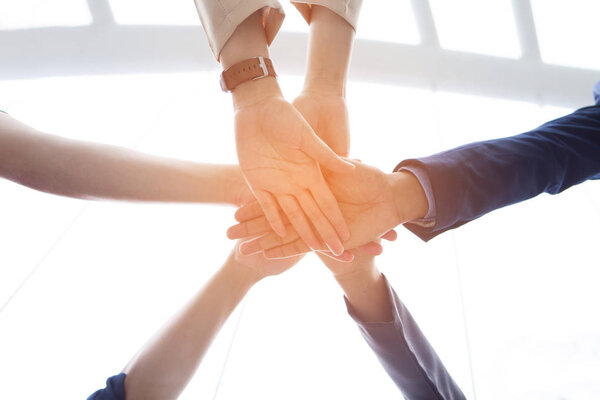 Teamwork people touch hands for unity group to succuss business.