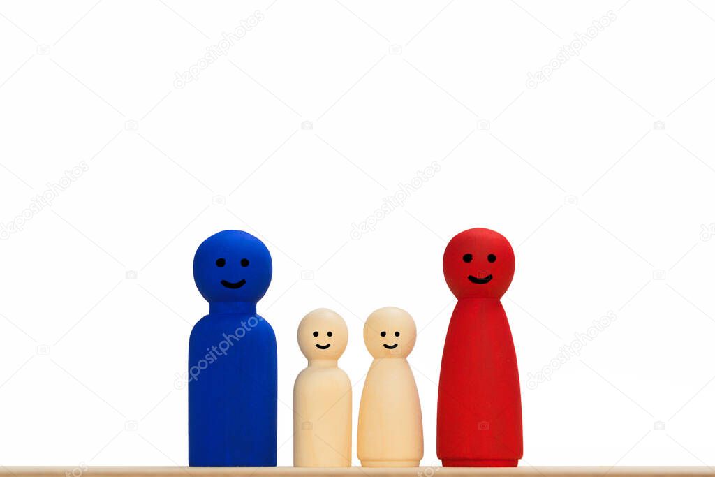 Family, husband, wife and children are laughing. Wooden symbol for man, woman, daughter and son. isolated against white background. Concept for family constellation, family therapy,