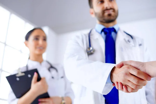 Young Arab Doctor Shakes Hands Patient Hospital — Stock Photo, Image