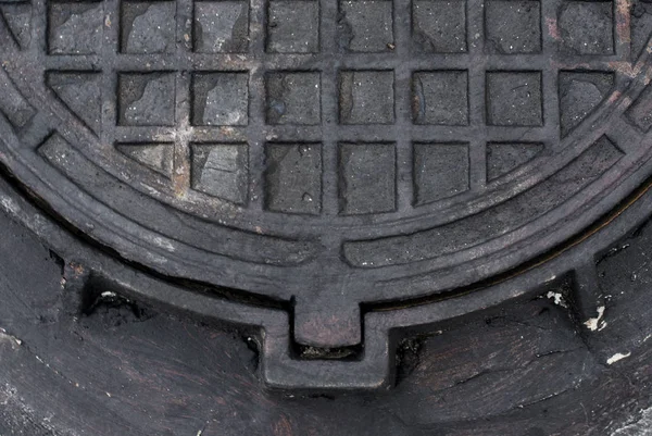 Metal manhole cover — Stock Photo, Image