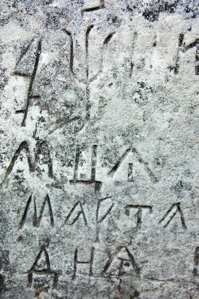 The surface of the old cross gravestone — Stock Photo, Image