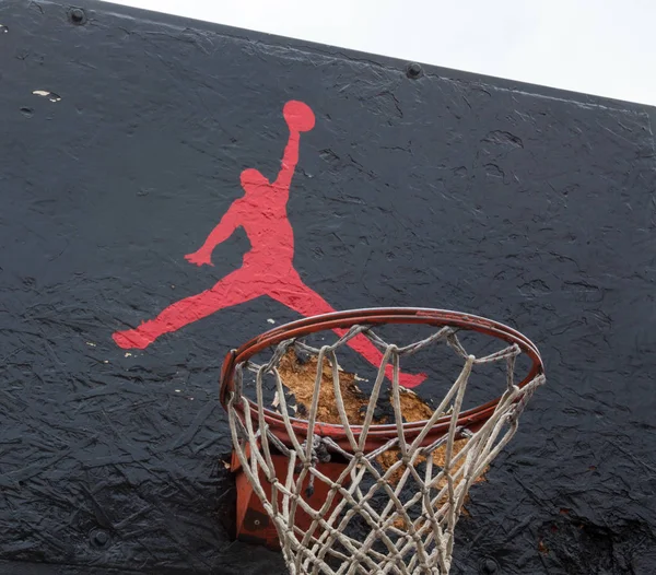 Jumpman logo by Nike on the basketball backboard — Stock Photo, Image