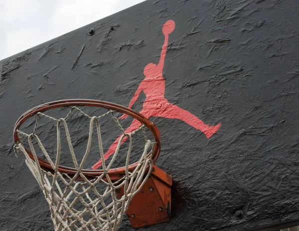 Jumpman logo by Nike on the basketball backboard — Stock Photo, Image