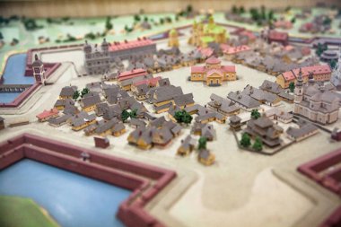 Old town scale model. Tiny houses, streets and trees.