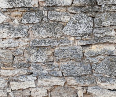 Eski taş duvar. Tuğla duvar Antik duvarcılık. Zengin ve çeşitli dokular.