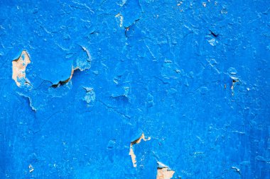 Mavi çatlamış yağlı boyalı yüzey zengin desenli.