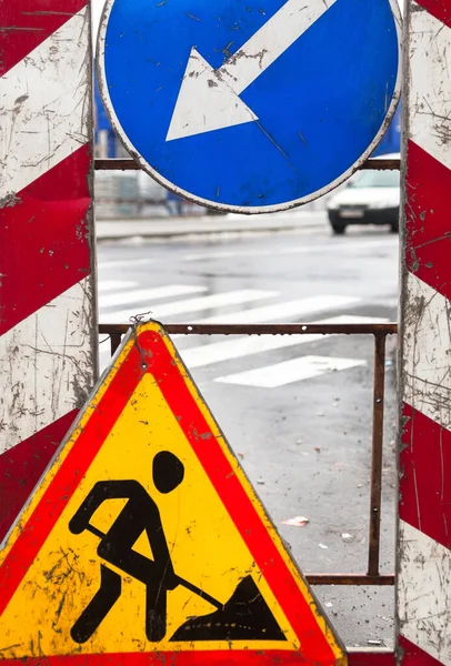 Road works. Traffic signs. Roadwork sign and keep left sign.