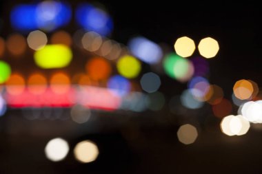Night in the city. Blurred lights for abstract color background.