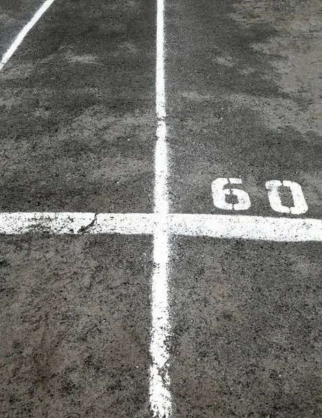 White Marking Lines Numbers Asphalt Surface — Stock Photo, Image