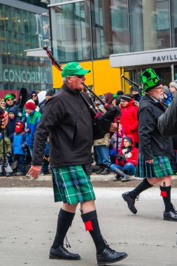 Montreal, Canada - March 17 2019 People celebrating the Saint Patrick`s Day Parade in Montreal downtown