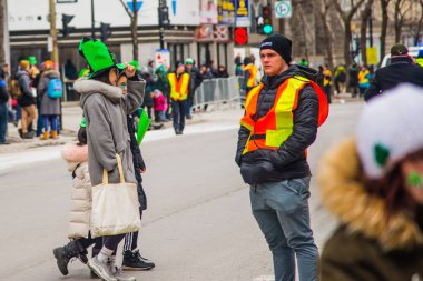 Montreal, Canada - March 17 2019 People celebrating the Saint Patrick`s Day Parade in Montreal downtown