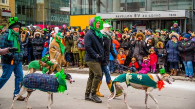 Montreal, Canada - March 17 2019 People celebrating the Saint Patrick`s Day Parade in Montreal downtown