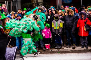 Montreal, Canada - March 17 2019 People celebrating the Saint Patrick`s Day Parade in Montreal downtown