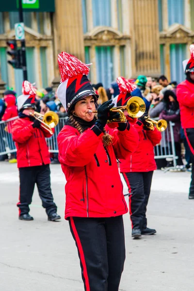 Montreal, Canada - March 17 2019 People celebrating the Saint Patrick`s Day Parade in Montreal downtown