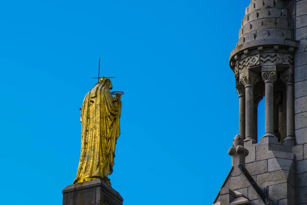 Sainte-Anne-de-Beaupre, Canada - August 20, 2019: The Virgin Mary statue at the basilica of Sainte-Anne-Beaupre in Quebec