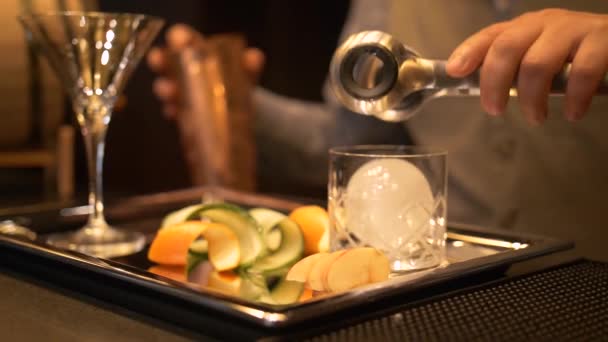 Bar Tender Adding Ice Ball Glass — Stock Video