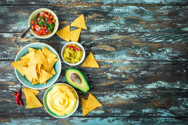 Tortilla chips and assorted dips