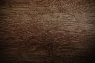 Koyu renk ahşap. Doğal bir şablona sahip arka plan yüzeyi. Çikolata rengi ahşap doku.