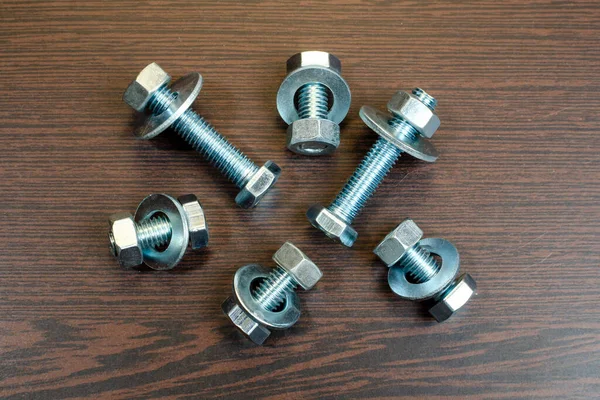 Group Metal Bolts Nuts Wooden Table Background — 스톡 사진