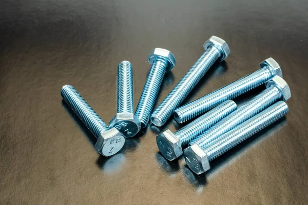 metal bolts in a group with a place for inscription