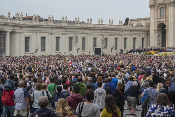 Vatican City / Rome / Italy - April 21, 2019: Crowd of people cheering for  Pope Francis at Easter Mass in St. Peter's Square.