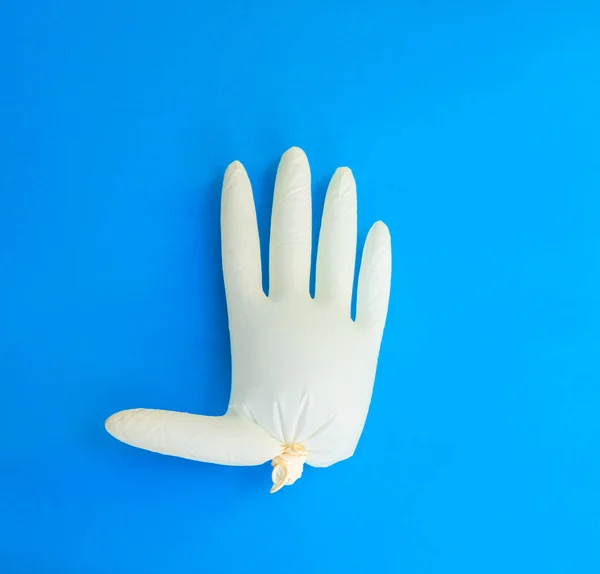 Protective Inflated Glove Blue Background Top View Medical Item Balloon — Stock Photo, Image