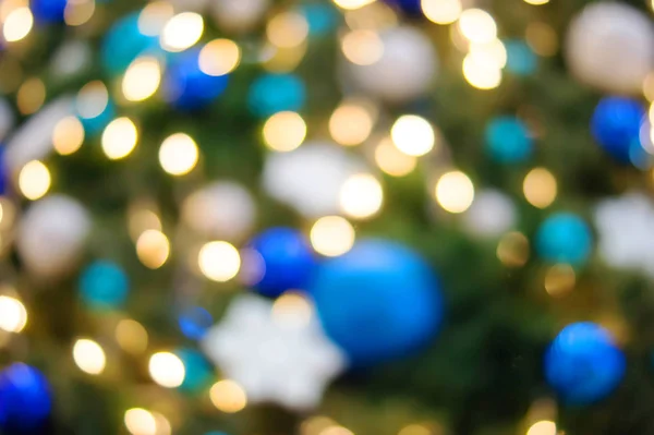 クリスマス ライトの黄金色と青のボケ味 — ストック写真