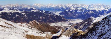 Aerial wide angle panorama of Zell am See and Kaprun tourist res clipart