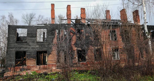 Burnt wooden residential house