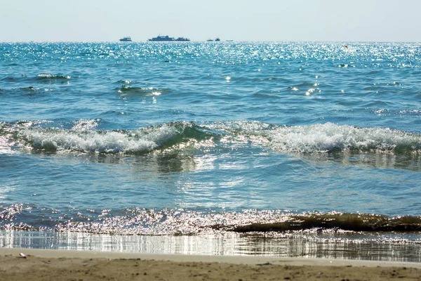 Glowing blue warm sea of Cyprus with nice sun reflections