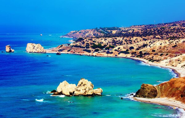 High contrast saturated colour view of famous blue emerald sea bay near the birthplace of Aphrodite in Cyprus in summer 2018 