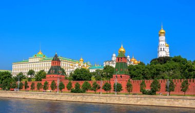 Vibrant view of Red walls of summer Kremlin in Moscow clipart