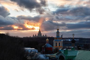 Sunset panorama of Sparrow hill area in spring Moscow under dramatic cloudy sky