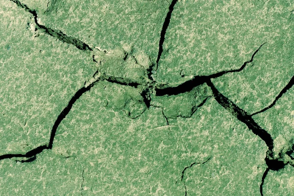 Треснувшая безжизненная текстура почвы крупным планом — стоковое фото