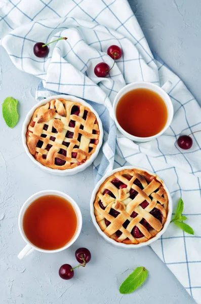 Cherry pies with fresh cherries