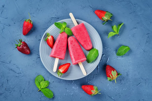 Strawberry banana ice cream with mint and strawberries